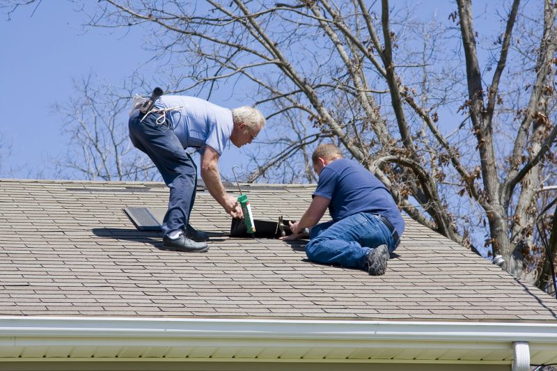 Local Asphalt Roofing pros at work